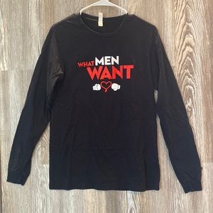 Black long sleeve T-shirt with what men want on the front. Medium
